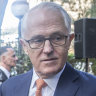 Crossing paths: Former foreign minister Julie Bishop and former prime minister Malcolm Turnbull at Martyn Cook's memorial service on Thursday.