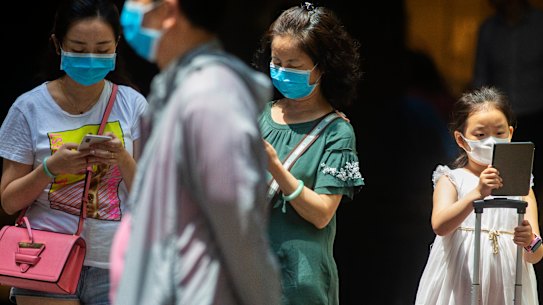 People wearing masks in Sydney's CBD.