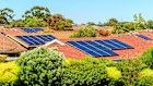 A virtual power plant involves coordinating solar panels and batteries installed across thousands of individual dwellings.