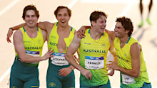 Rohan Browning, Josh Azzopardi, Lachlan Kennedy and Calab Law celebrate after winning the men’s 4x100m relay.