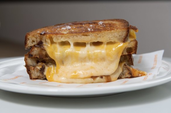 Three cheeses go into the oozy toastie at Baguette Studios in North Melbourne.