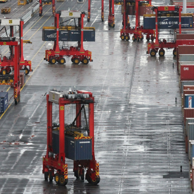 An automated terminal at Port Botany, where machines load vast volumes of goods onto ships without touching human hands. 
