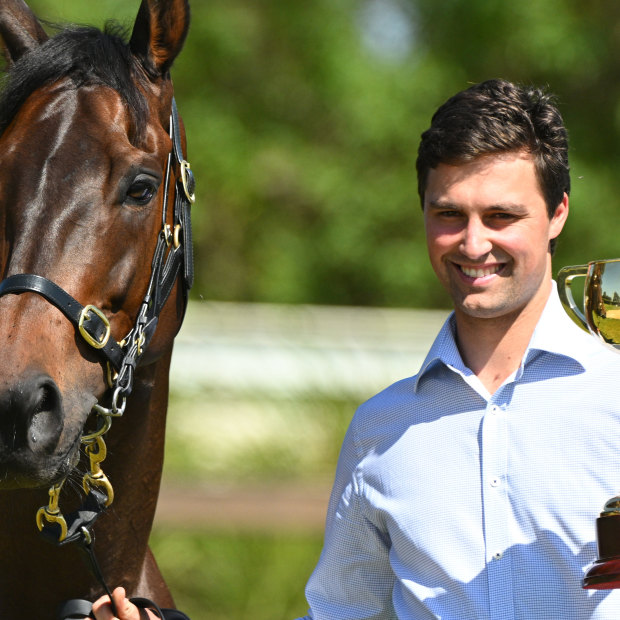 All smiles: Sam Freedman poses with Melbourne Cup winner Without A Fight on the Mornington Peninsula.