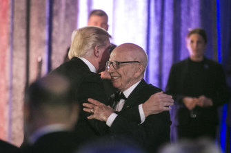 President Donald Trump and Rupert Murdoch at a dinner in New York City in 2017.