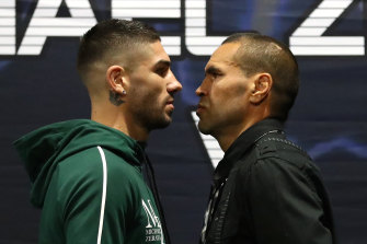 Michael Zerafa and Anthony Mundine face off during their press conference in Melbourne on Thursday.