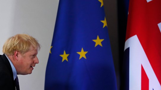 British Prime Minister Boris Johnson arrives for a media conference at an EU summit in Brussels, Thursday, Oct. 17, 2019. Britain and the European Union reached a new tentative Brexit deal on Thursday, hoping to finally escape the acrimony, divisions and frustration of their three-year divorce battle. 