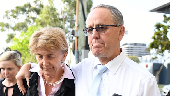 Dreamworld facilities supervisor Scott Ritchie (right) is seen leaving the Magistrates Court at Southport.