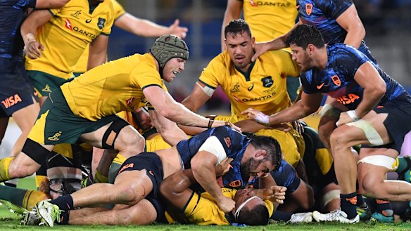 Willing: Nahuel Tetaz Chaparro of the Pumas wrestles with Allan Alaalatoa.