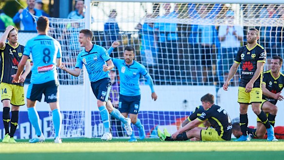 Brandon O'Neill gives the 12,000-plus fans at Leichhardt Oval something to celebrate with Sydney's opener.