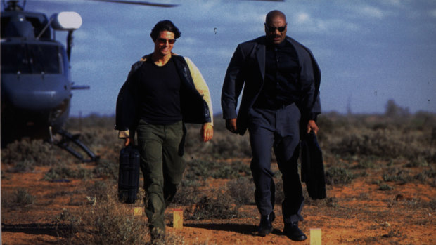 Postcard locations: Tom Cruise and Ving Rhames in Mission Impossible II. 