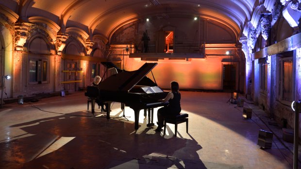 Elizabeth Drake and Caroline Almonte perform at the Flinders Street Station ballroom in 2012.