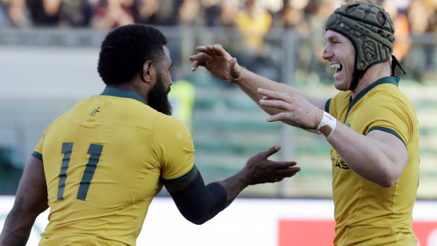 Another omission: Marika Koroibete celebrates with David Pocock after scoring against Italy.