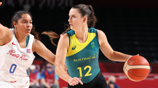 Tess Lavey #12 of Team Australia drives to the basket against Jennifer O’Neill.