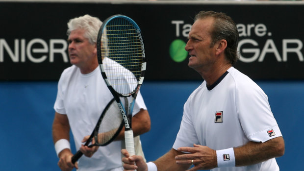 McNamara (right) alongside his old doubles partner Paul McNamee in a seniors match at the Australian Open back in 2008.