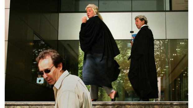 Nicola Gobbo enters court with Con Heliotis, QC in 2006.