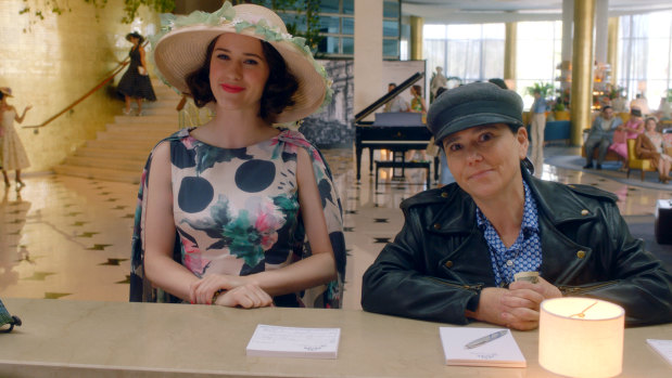 Alex Borstein (right, pictured with Rachel Brosnahan) says she is surprised that her character Susie Myerson has become a major character in the hit show The Marvelous Mrs Maisel.