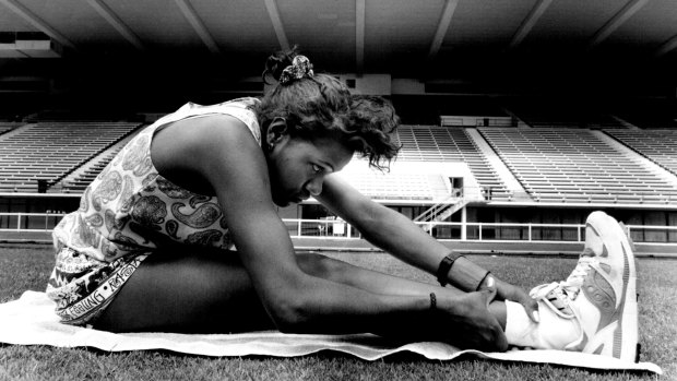 Cathy Freeman stretches out during training at Brisbane's Queen Elizabeth II Stadium on January 13, 1990. 