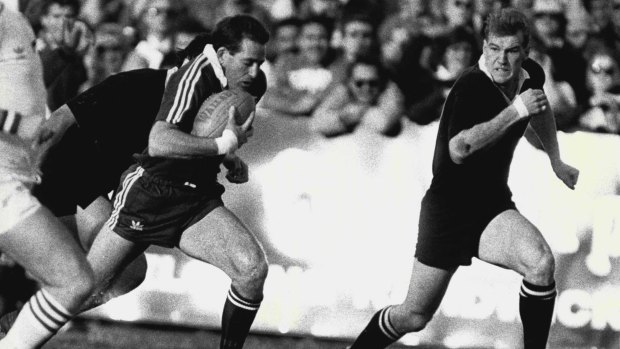 Iconic match: David Campese runs the ball with the All Blacks' John Kirwan in pursuit at Coogee Oval on June 22, 1988.