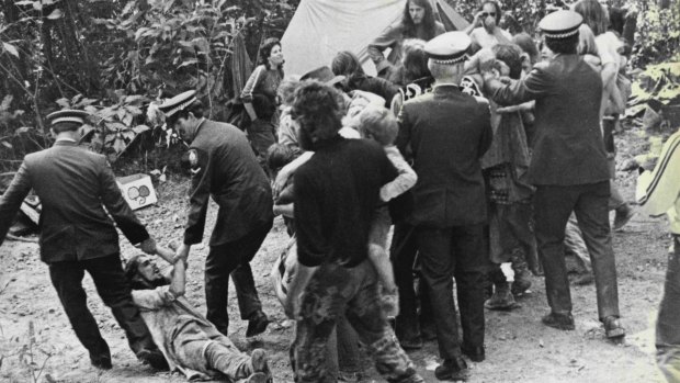 Police drag away conservationists at Terania Creek in August, 1979.