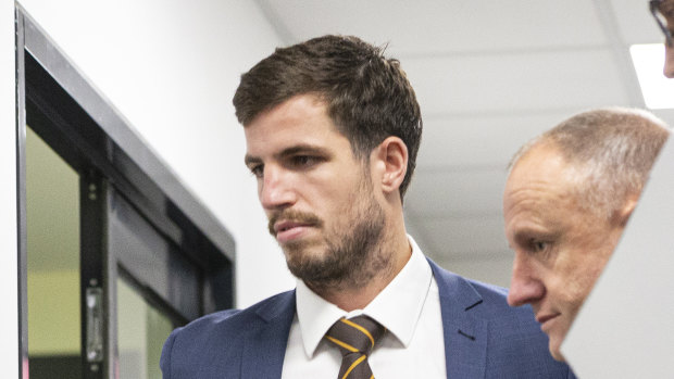 Ben Stratton leaves the tribunal after being banned for two matches and fined $1000.