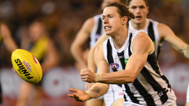 Collingwood defender Tom Langdon is set to make a decision on where he will play next season.