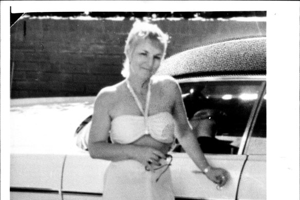 Shirley Finn with the Dodge Phoenix car in which she was found murdered.