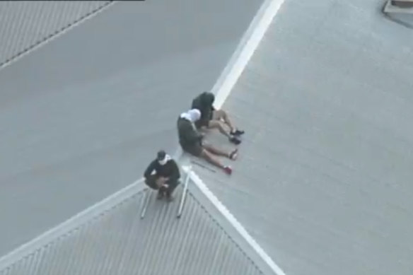 Inmates on the roof of Port Phillip Prison last month.  