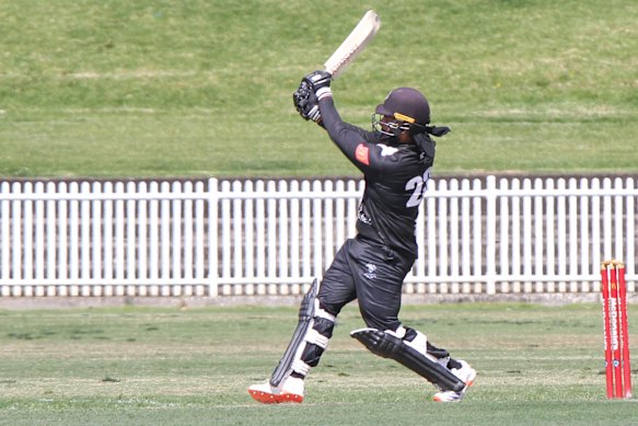 Harjas Singh clubs another six.