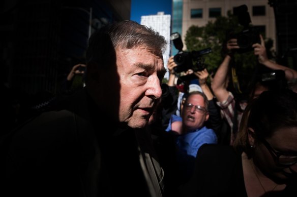 Cardinal George Pell arriving at the Melbourne County Court for sentencing last year. 