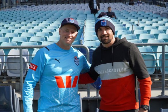 Blues coach Michael Maguire and Socceroos player Mat Ryan at NSW training on Tuesday.