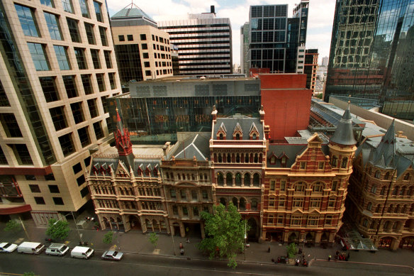 The previous low-rise building behind the heritage buildings, pictured in 2006.