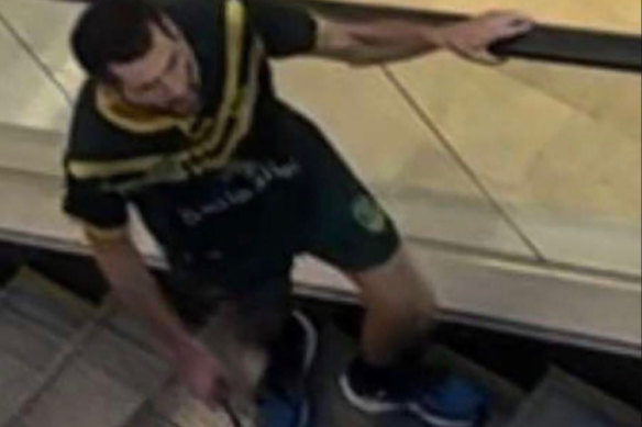 Cauchi on an escalator inside Bondi Junction Westfield.