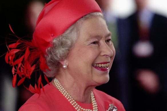 The Queen wore bright pink for a visit to Queensland in 2002.