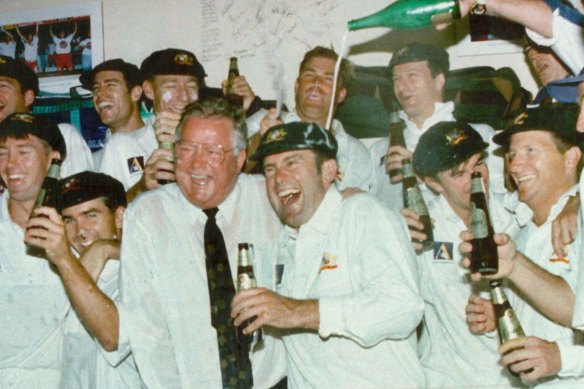 Mark Taylor celebrates with the Australian team after they retained the Frank Worrell Trophy in 1998. The match was played on Australia Day.
