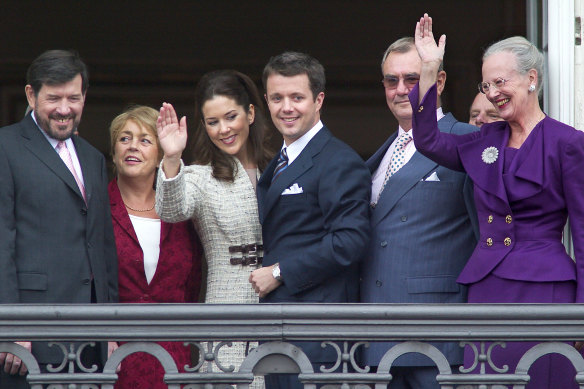 From left: Mary’s father John Donaldson, her stepmother Susan Moody, Mary, Crown Prince Frederik, Prince Consort Henrik and Queen Margrethe II at the couple’s engagement announcement at  Amalienborg Palace in 2003.