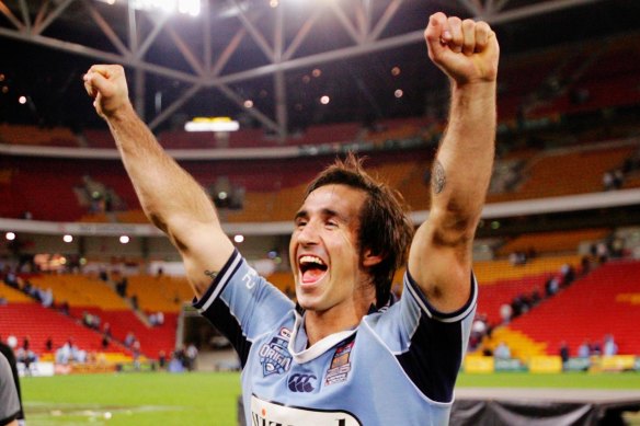 Andrew Johns celebrates his career-defining 2005 Origin series victory for NSW.