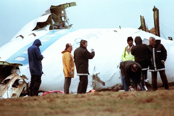 The crashed Pan Am flight 103, a Boeing 747 airliner in a field near Lockerbie, Scotland in 1988. 