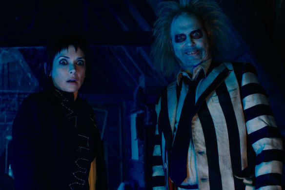 Lydia (Winona Ryder) and Beetlejuice (Michael Keaton) reunite in Tim Burton’s long-delayed sequel <i/>Beetlejuice Beetlejuice<i/>.