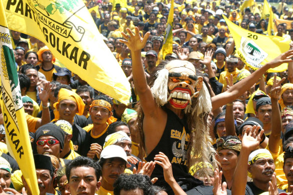 Golkar was the dominant political party during Suharto’s New Order regime. Here supporters attend a rally in Bali in 2004.