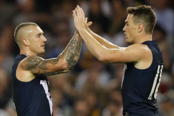 Dustin Martin (left) and Jeremy Cameron celebrate a goal for Victoria in the 2020 State of Origin clash that raised money for bushfire relief. 