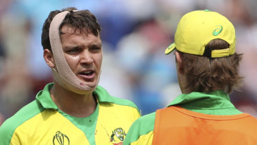 A bandaged Alex Carey battles on against England in Birmingham. 