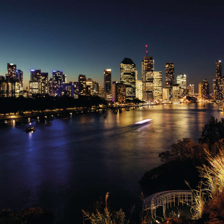 The sun sets on the Brisbane River, which was once treated like a sewer.