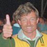 Alan Bond and John Bertrand celebrate victory in Newport on September 26, 1983.