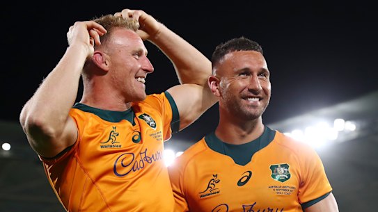Quade Cooper, right, celebrates with Reece Hodge after kicking the winning penalty last weekend.