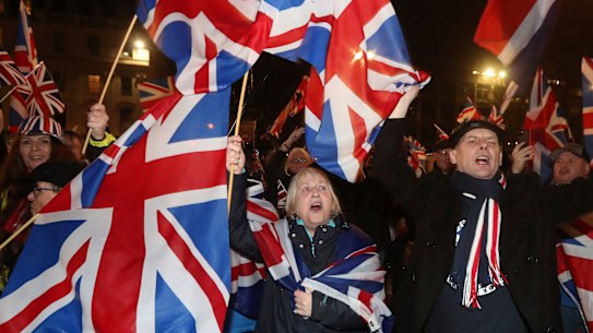 Brexit supporters celebrate in Glasgow, England, as Britain left the EU on January 31, 2020. 