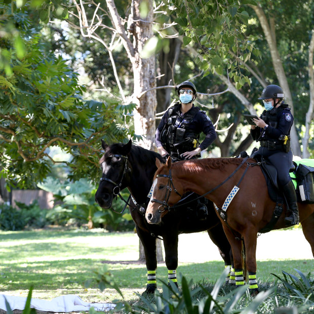 Police on horseback enforcing Brisbane’s lockdown.