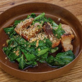 Crisp pork belly with Chinese broccoli.