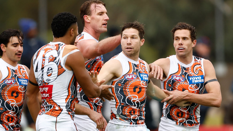 Melbourne’s top-four spot under threat as Kelly and Giants stun Demons