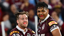 Selwyn Cobbo and Cameron Munster celebrate one of the hat-trick hero's tries.