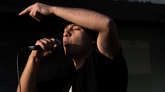 Rapper Lxgcy performing at the Street University block party. 